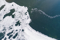 Frozen lake in Iceland in winter. Aerial photo captured with a camera drone (Phantom) by Paul Oostveen.