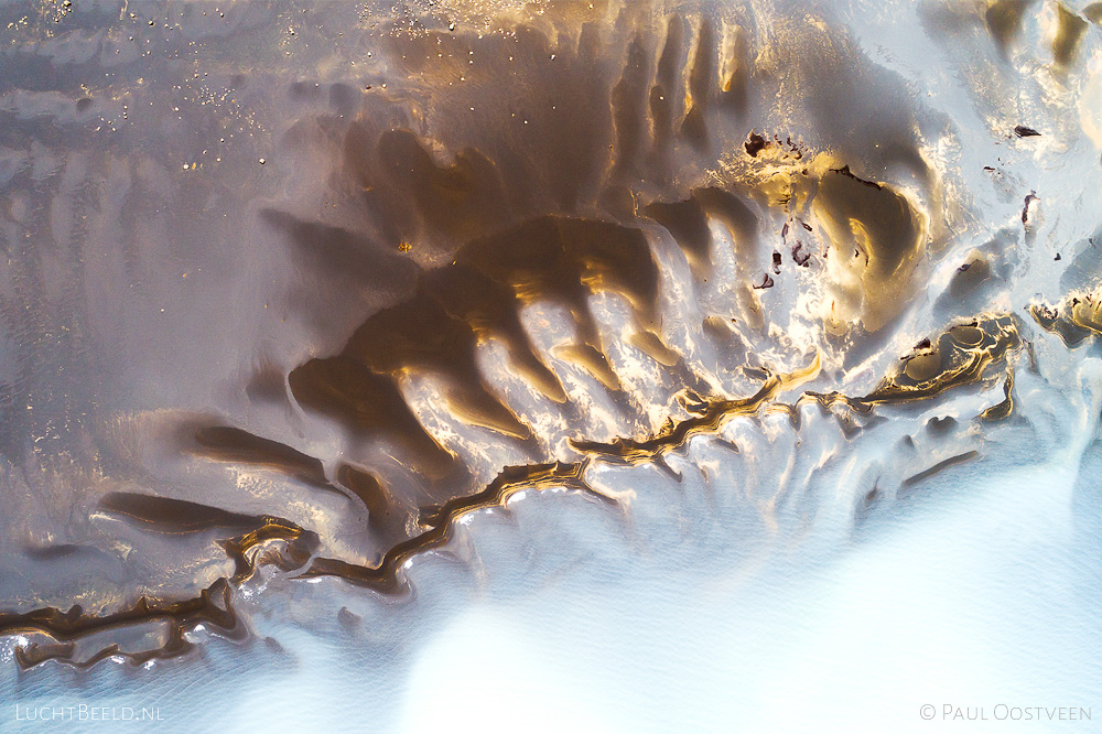 Sandbanks in lake in Sprengisandur area in the highlands of Iceland. Aerial photo captured by drone.