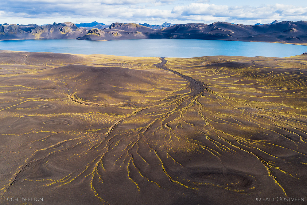 Slope in Veiðivötn area with lake Graenavatn in the highlands of Iceland. Aerial photo captured by drone in Veidivötn.